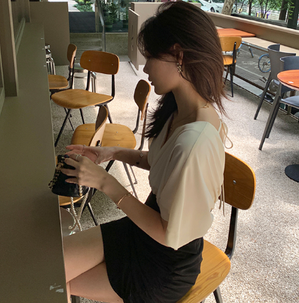 夏季短裙买大还是买小1